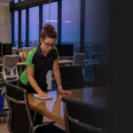 Lady cleaning the table